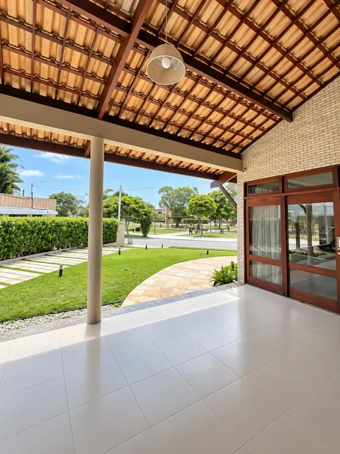 Varanda com vista para o jardim e a praça
